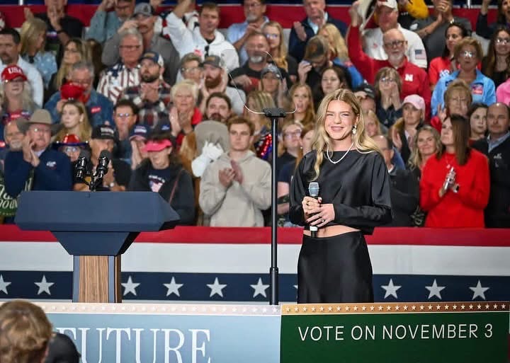 Olivia Faith holding a microphone at the October 22 event in North Platte.
